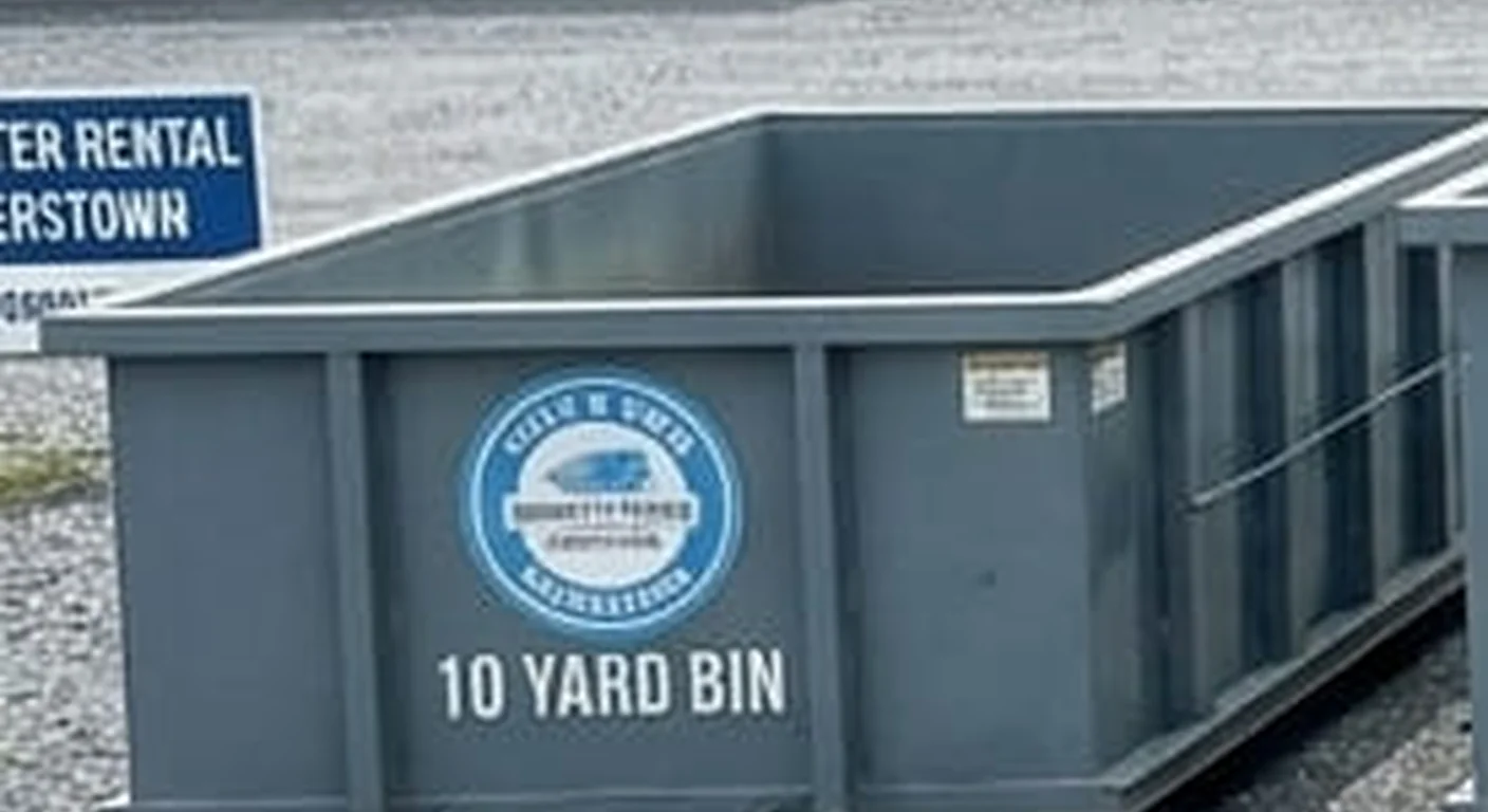 10 Yard Dumpster Rental in Hagerstown, MD A clean, correctly-labeled 10 yard Issac & Sons Dumpster Rental roll-off container staged at the company yard on Burhans Blvd