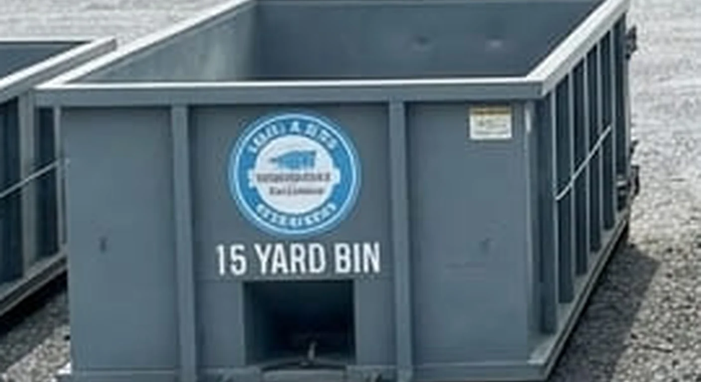 15 Yard Dumpster Rental in Hagerstown, MD A clean, correctly-labeled 15 yard Issac & Sons Dumpster Rental roll-off container staged at the company yard on Burhans Blvd